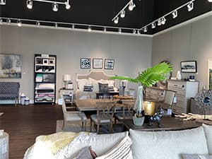 Boutique furniture store interior featuring custom shelving and décor designed by Jeff Smith Construction in Lincoln, CA.