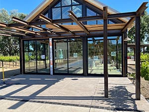 HOA community facility construction in El Dorado Hills. Exterior view of an HOA community building under construction near a pool area in El Dorado Hills, CA.